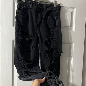 Black ripped mom jeans cropped